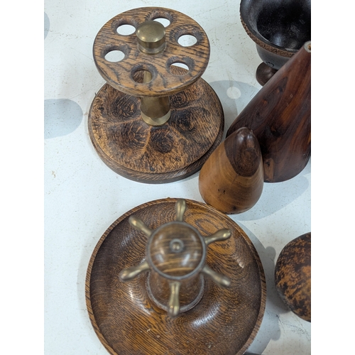 5 - Treen items to include two smoking pipe holders, a vintage wooden barrel puzzle, along with other it... 
