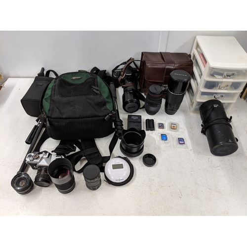 52 - Photographic equipment to include a Pentax 300mm lens, a Pentax K20 camera, a Sigma Telephoto 400mm ... 