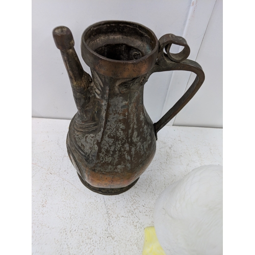 55 - Metalware to include a brass fireside companion set, a Middle Eastern pot, a composition Art Nouveau... 