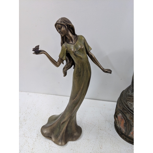55 - Metalware to include a brass fireside companion set, a Middle Eastern pot, a composition Art Nouveau... 
