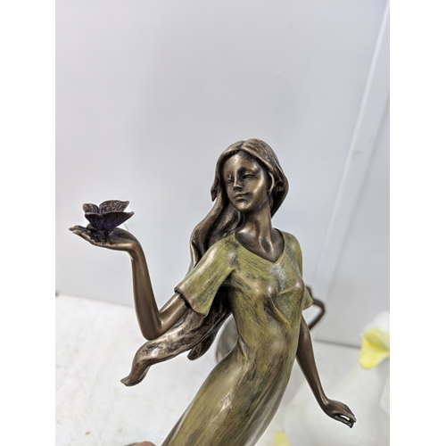 55 - Metalware to include a brass fireside companion set, a Middle Eastern pot, a composition Art Nouveau... 