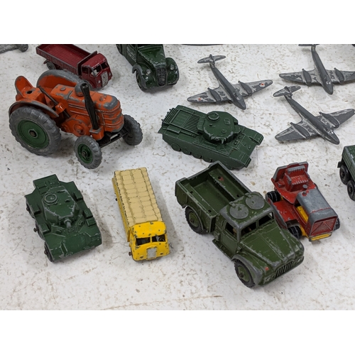 57 - Diecast model vehicles to include Dinky farm and military vehicles, Corgi and others 
Location: GM
I... 