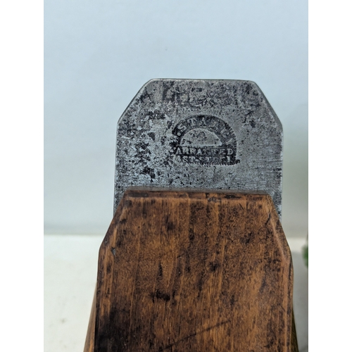 9 - A collection of traditional wooden woodworking tools including several planes, Granny's tooth router... 