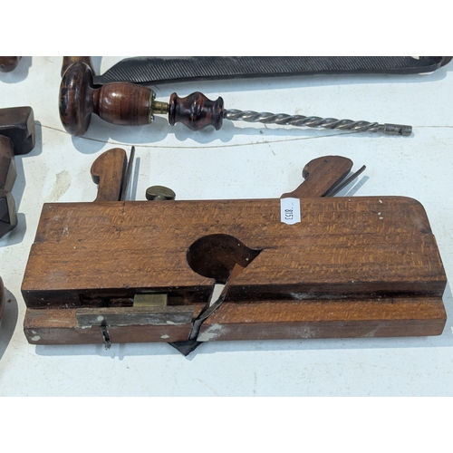 9 - A collection of traditional wooden woodworking tools including several planes, Granny's tooth router... 