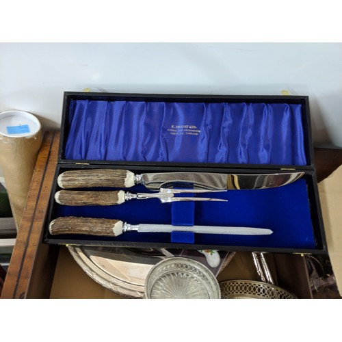 38 - A small collection of silver plates to include a set of twelve dinner plates, two cake servers, wine... 