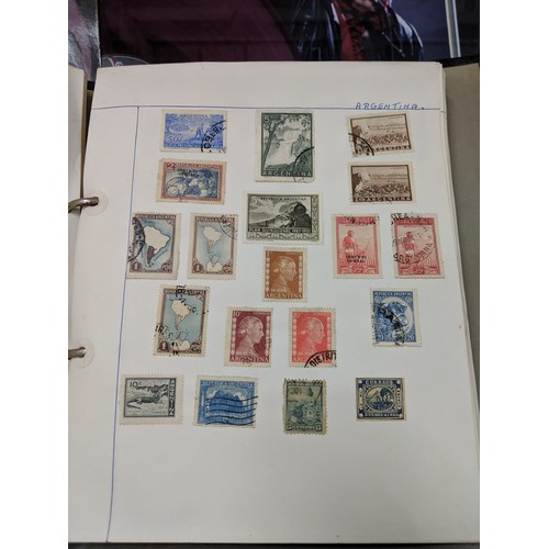 41 - Stamps from around the world to include Australia, Hungary, Jamaica and others, housed in three albu... 