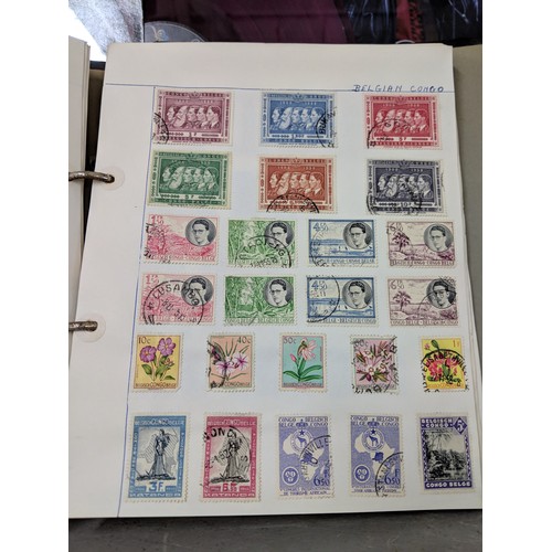 41 - Stamps from around the world to include Australia, Hungary, Jamaica and others, housed in three albu... 