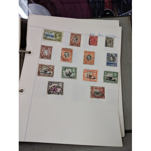 41 - Stamps from around the world to include Australia, Hungary, Jamaica and others, housed in three albu... 