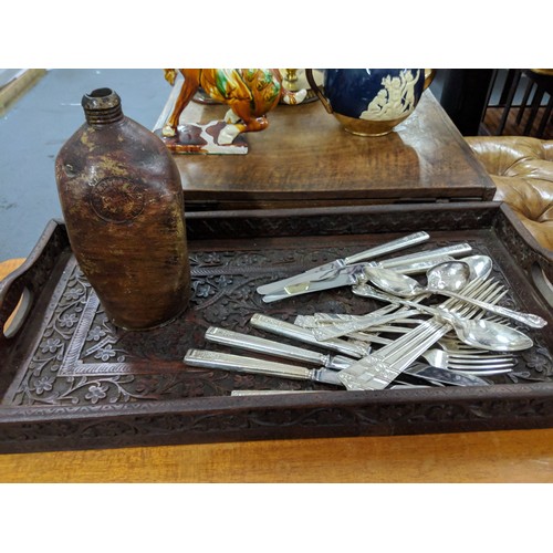 48 - A mixed lot to include silver plated cutlery, a Doulton Lambeth vase, a large carved tray, a teapot ... 
