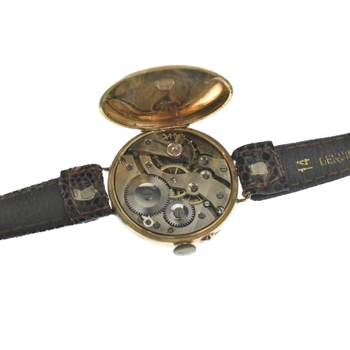 1 - WW1 military interest: An early 20th century 9ct gold gents trench wristwatch, having a white enamel... 