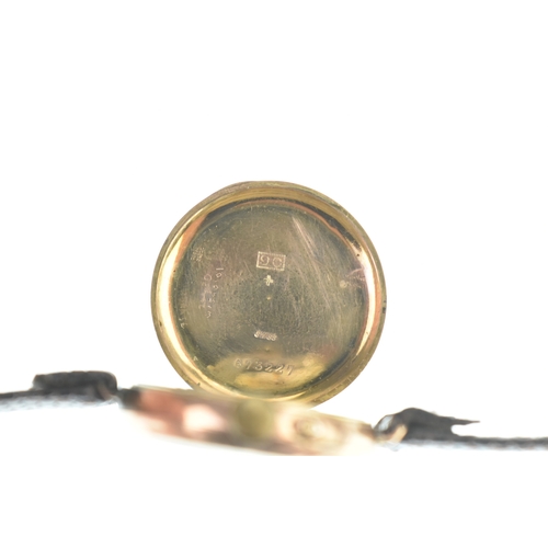 1 - WW1 military interest: An early 20th century 9ct gold gents trench wristwatch, having a white enamel... 
