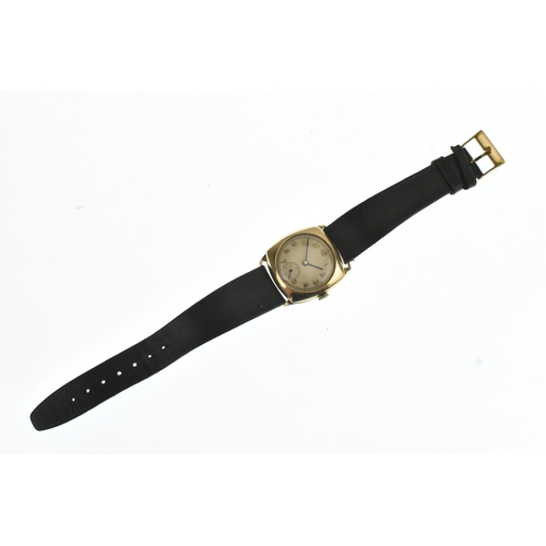 15 - An early/mid 20th century 9ct gold gents mid-size manual wind wristwatch, having a silvered dial wit... 