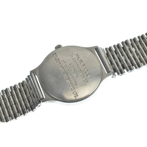 18 - A Longines Flagship, manual wind, gents, stainless steel wristwatch, the silvered dial having baton ... 
