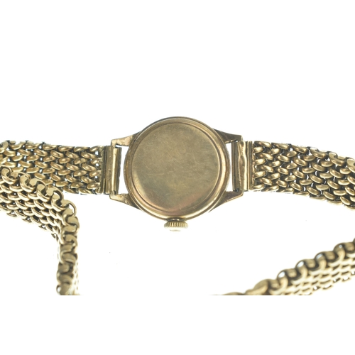 21 - An Omega 9ct gold, ladies, manual wind wristwatch, having a silvered dial with gilt baton markers, f... 
