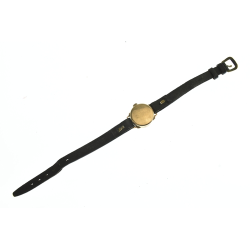 22 - A Tudor 9ct gold ladies manual wind wristwatch, the silvered dial having gilt baton markers, on a la... 