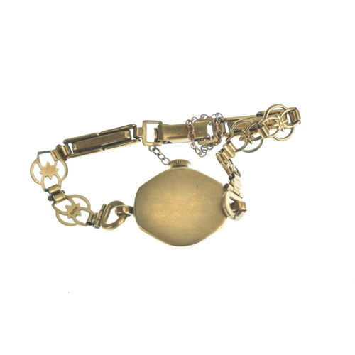 23 - An Everite 9ct gold ladies manual wind wristwatch, the dial having baton markers and Arabic numerals... 