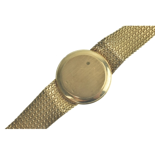 24 - An Omega 9ct gold, gents, quartz wristwatch, the gilt dial having baton markers, the case back numbe... 