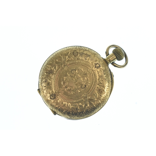 36 - A circa 1900 18ct gold ladies fob watch, the silvered dial having Roman numerals, floral engraved ca... 