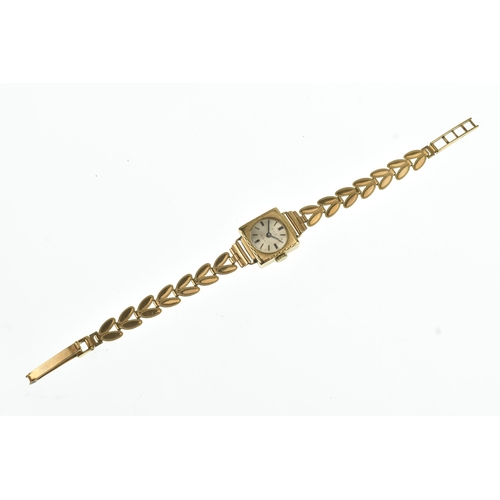 40 - An Avia 9ct gold ladies manual wind wristwatch, the circular silvered dial having baton markers, fit... 