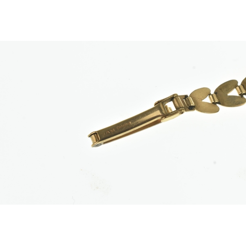 40 - An Avia 9ct gold ladies manual wind wristwatch, the circular silvered dial having baton markers, fit... 