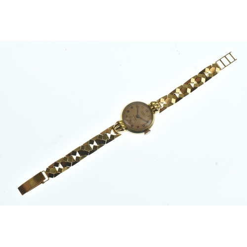 46 - A Titus 18ct gold ladies manual wind wristwatch, the dial having Arabic numerals and subsidiary seco... 