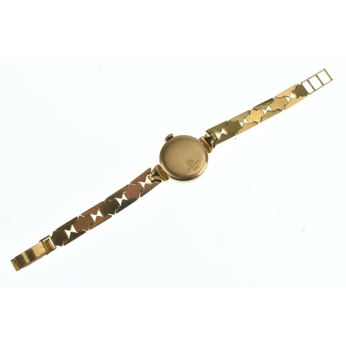 46 - A Titus 18ct gold ladies manual wind wristwatch, the dial having Arabic numerals and subsidiary seco... 