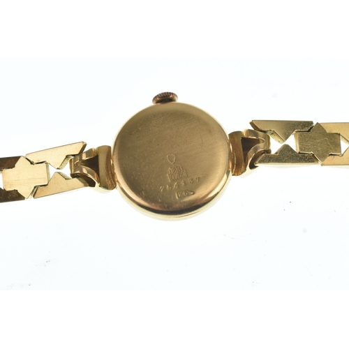 46 - A Titus 18ct gold ladies manual wind wristwatch, the dial having Arabic numerals and subsidiary seco... 