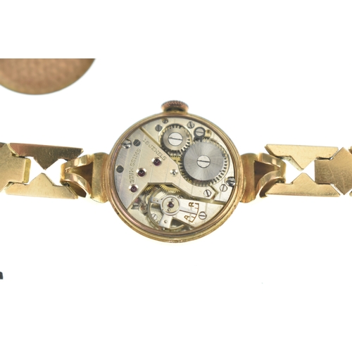 46 - A Titus 18ct gold ladies manual wind wristwatch, the dial having Arabic numerals and subsidiary seco... 