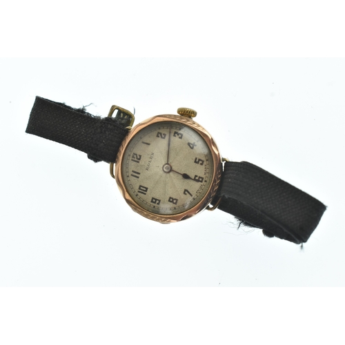 48 - An early 20th century Rolex ladies 9ct gold manual wind wristwatch, the engine turned circular dial ... 