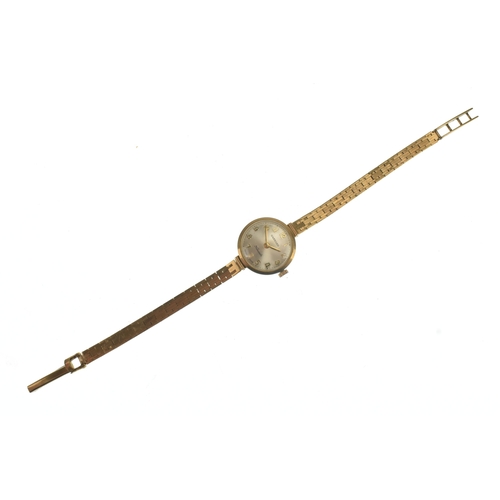 49 - A Garrard 9ct gold ladies manual wind wristwatch, the silvered dial having gilt Arabic numerals and ... 