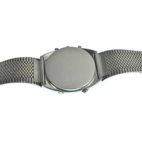 9 - An Omega Speedmaster Quartz stainless steel LCD gents watch, having a digital display, five push but... 