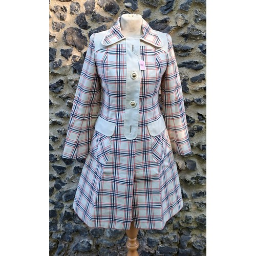 A 1970's 2 piece ladies checked 'Going Away' outfit (2 missing buttons available in front pocket'. Location: Mannequin
If there is no condition report, please request