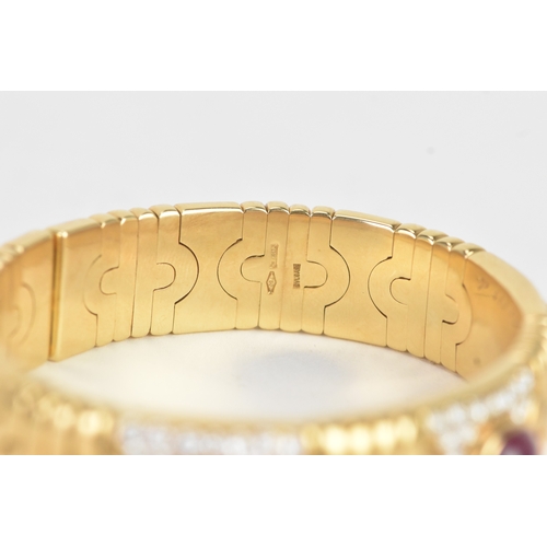 1 - A Bulgari ‘Parentesi’ 18ct gold, diamond, ruby and sapphire bracelet, of articulated geometric desig... 