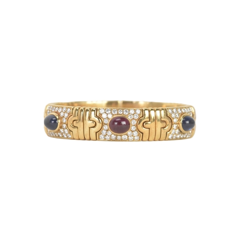 1 - A Bulgari ‘Parentesi’ 18ct gold, diamond, ruby and sapphire bracelet, of articulated geometric desig... 