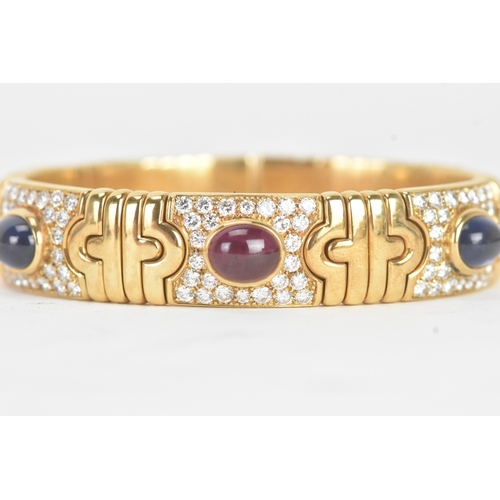 1 - A Bulgari ‘Parentesi’ 18ct gold, diamond, ruby and sapphire bracelet, of articulated geometric desig... 