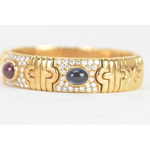 1 - A Bulgari ‘Parentesi’ 18ct gold, diamond, ruby and sapphire bracelet, of articulated geometric desig... 