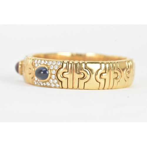 1 - A Bulgari ‘Parentesi’ 18ct gold, diamond, ruby and sapphire bracelet, of articulated geometric desig... 