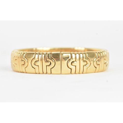 1 - A Bulgari ‘Parentesi’ 18ct gold, diamond, ruby and sapphire bracelet, of articulated geometric desig... 