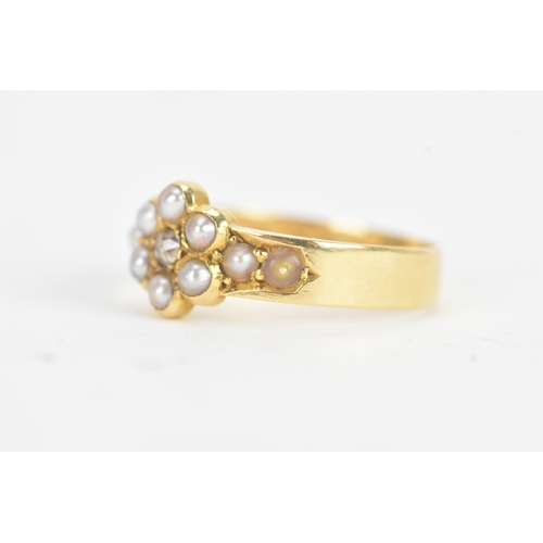 10 - A late Victorian diamond and seed pearl 18ct gold ring, the old cut diamond in a six claw setting me... 