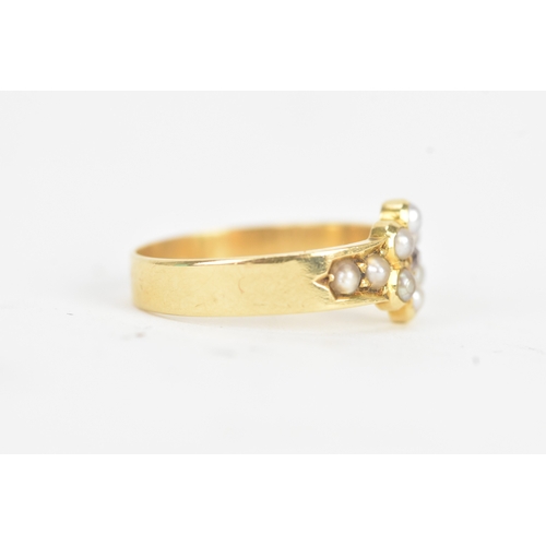 10 - A late Victorian diamond and seed pearl 18ct gold ring, the old cut diamond in a six claw setting me... 