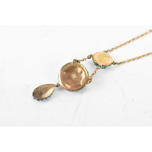 11 - A Victorian turquoise pave set 9ct gold necklace, the chain suspending three graduated domed cluster... 