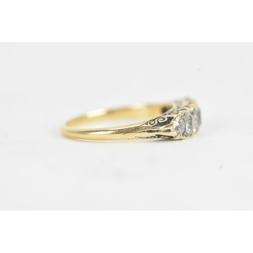 14 - A late 19th/early 20th century diamond yellow gold engagement ring, unmarked, set with five graduate... 
