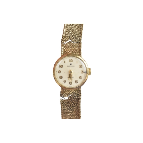 18 - A Rolex 9ct gold ladies manual wind wristwatch, the dial having Arabic numerals with gilt hands, Rol... 