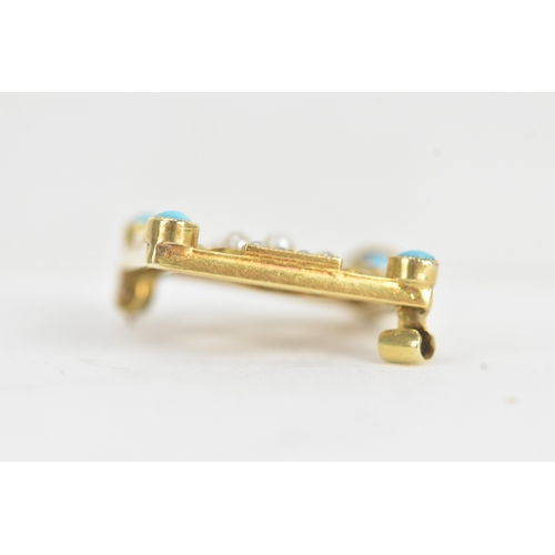 21 - An Edwardian turquoise and seed pearl 15ct gold pendant, of openwork lozenge form, the four corners ... 