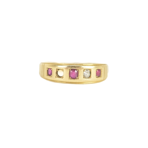 24 - A ruby and diamond 18ct gold ring, set with three rubies and one diamond (one diamond missing), the ... 