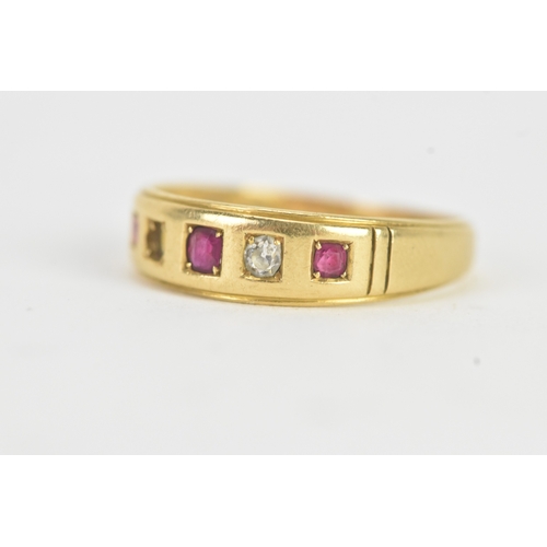 24 - A ruby and diamond 18ct gold ring, set with three rubies and one diamond (one diamond missing), the ... 