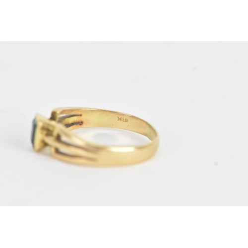 26 - An emerald 18ct yellow gold dress ring, the flush set emerald measuring approximately 4.2mm x 5mm, t... 