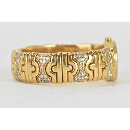 3 - A Bulgari ‘Parentesi’ 18ct gold and diamond lady’s wristwatch, the circular champagne dial with gilt... 