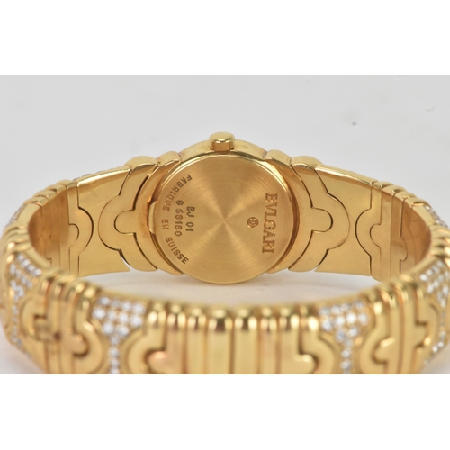 3 - A Bulgari ‘Parentesi’ 18ct gold and diamond lady’s wristwatch, the circular champagne dial with gilt... 