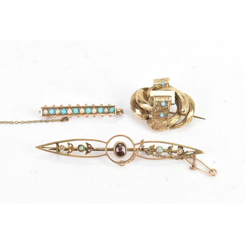 33 - Three 19th century/early 20th century brooches, to include a 9ct yellow gold opal and seed pearl bar... 